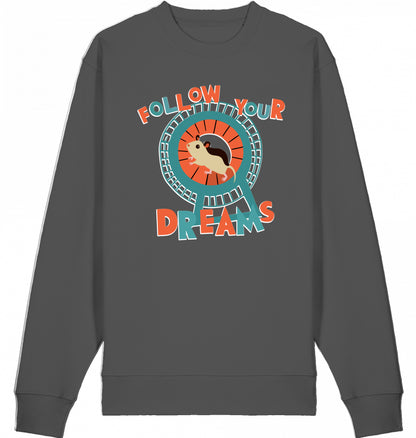 Illustration eines Hamsters im Laufrad mit der Typografie ‚Follow Your Dreams‘ im collageartigen Cartoon-Stil auf einem Baumwoll-Sweatshirt
