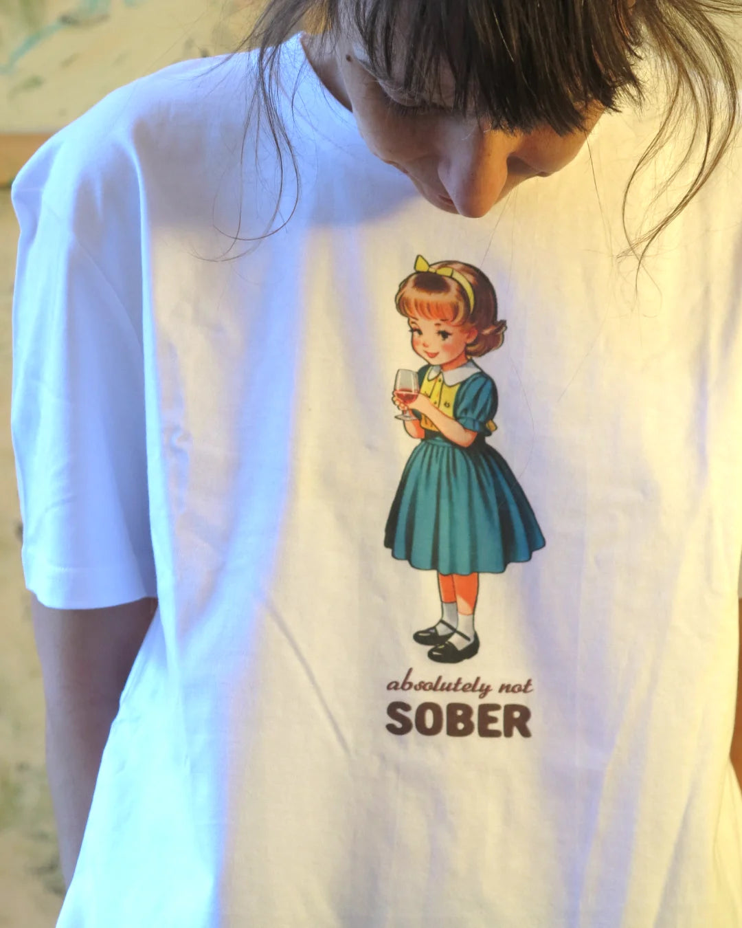 white Shirt with retro print, glass of wine, girl illustration