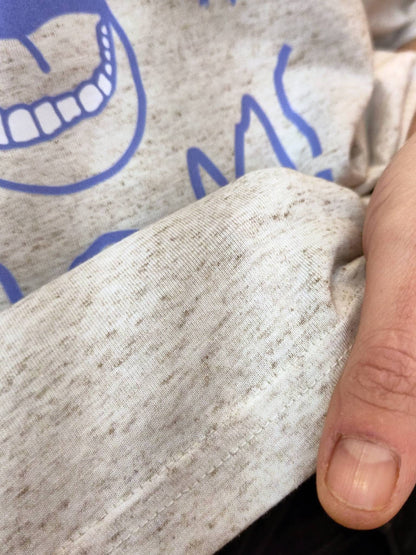 Detail of  seam- catcall your mom-print in hand writing, eco-friendly organic t-shirt, fair wear